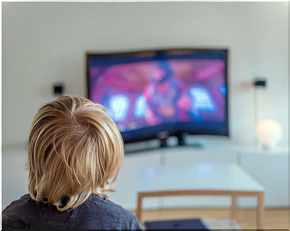 Child watching a movie with bad television habits.