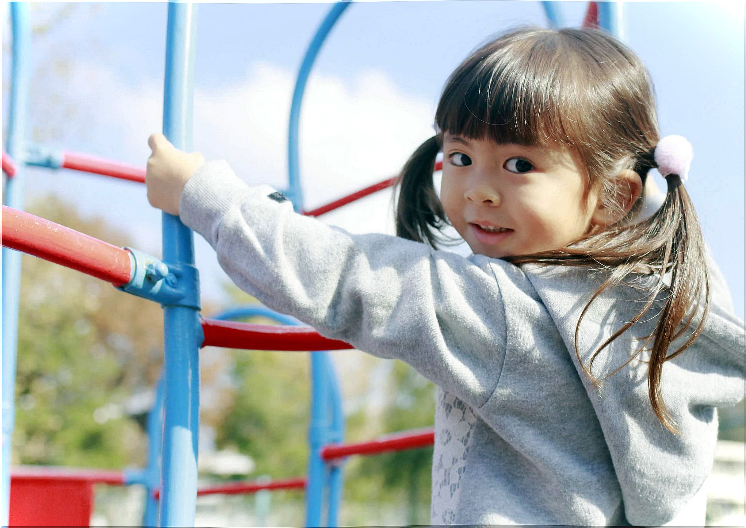 Girl under 5 years old doing physical activity.