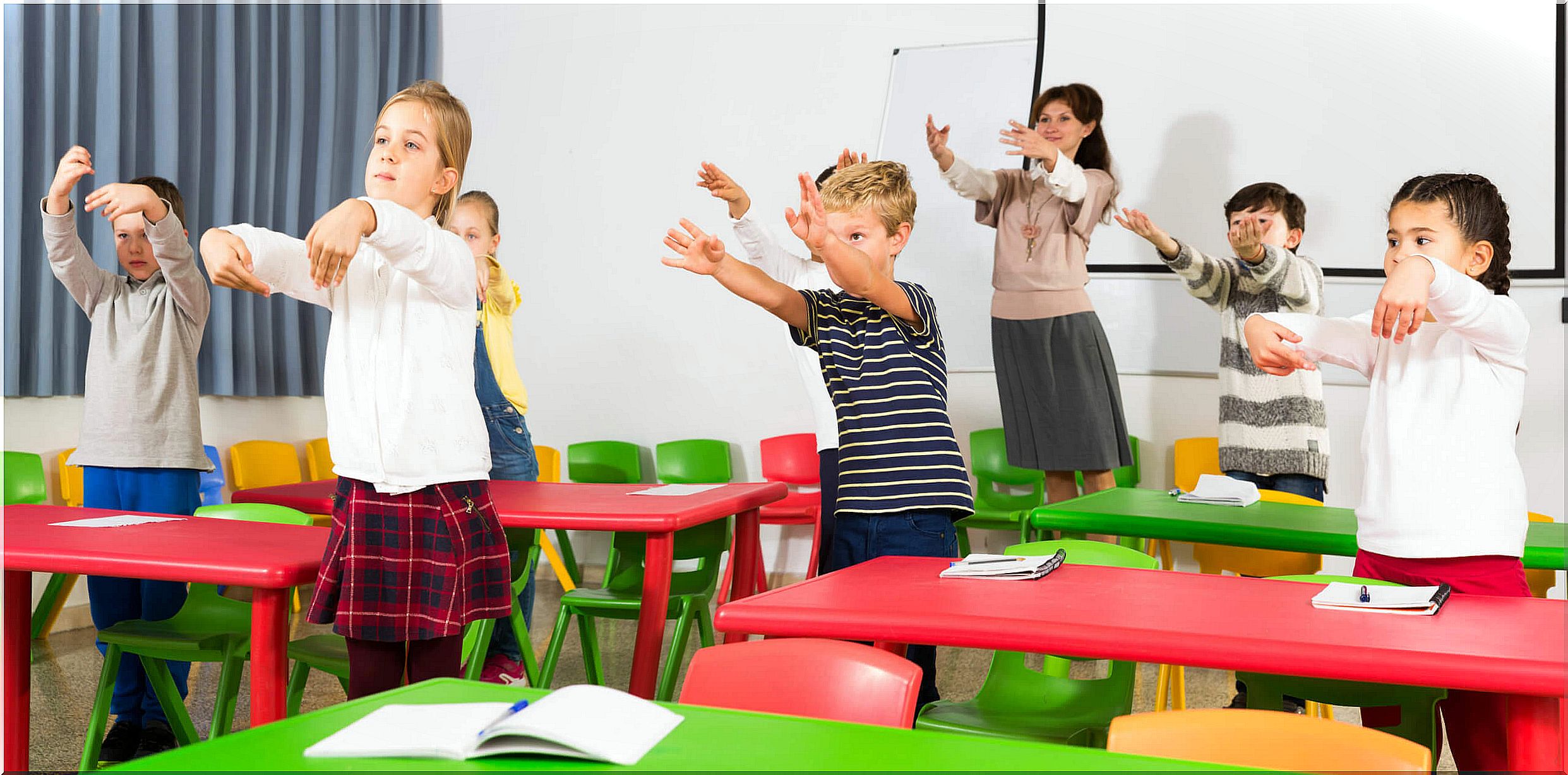 Teacher with her students in class during one of the active breaks.