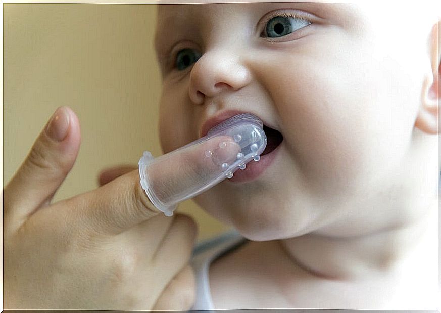 Silicone baby toothbrush.