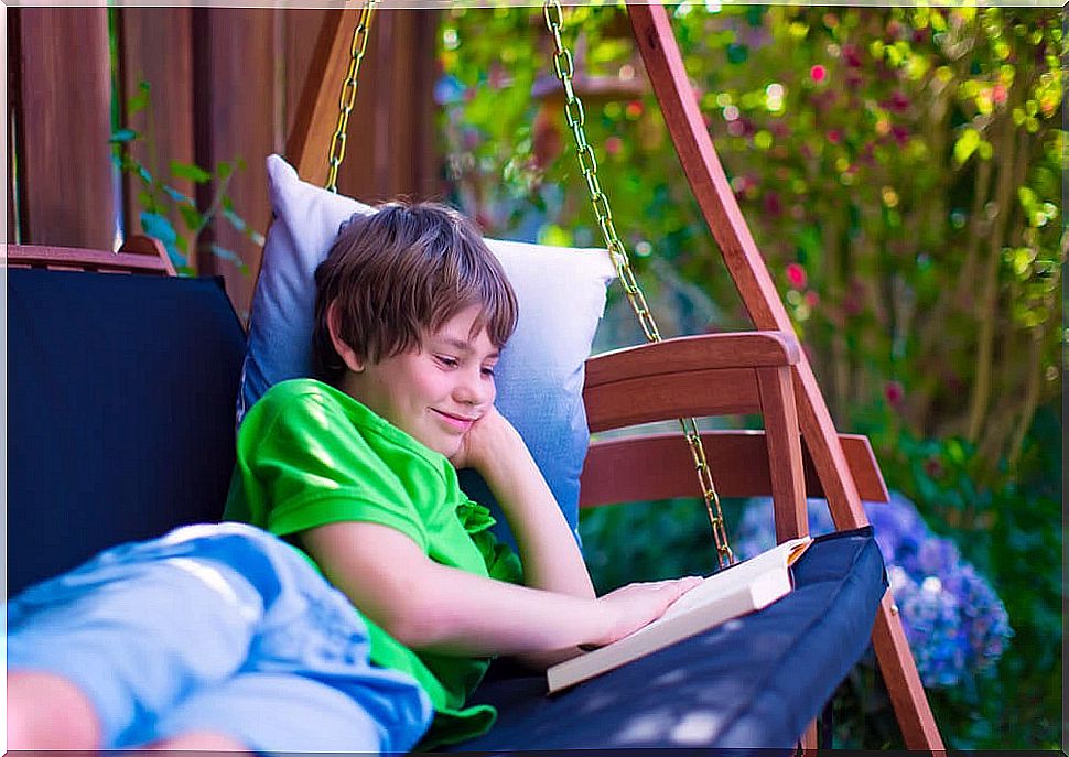 Teen boy reading one of the books to travel back in time.